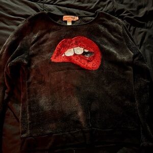Stylish Black Sweater with Red Sequin Lip Design